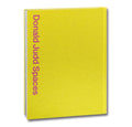 Front cover of the Donald Judd Spaces art book by Judd Foundation, featuring minimalist design and images of Judd's architectural works.