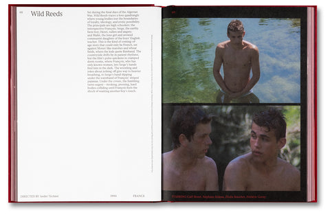 A24 In the Mood? film book open to pages featuring vintage movie posters and film stills, highlighting classic cinema visuals.