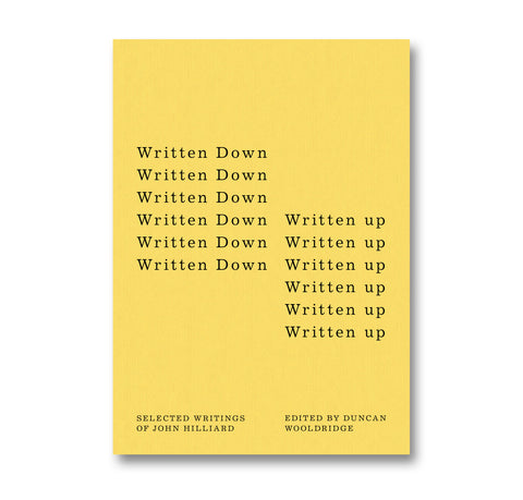 Cover of "Written Down / Written Up: Selected Writings of John Hilliard" by MACK, featuring a minimalist yellow design with text.