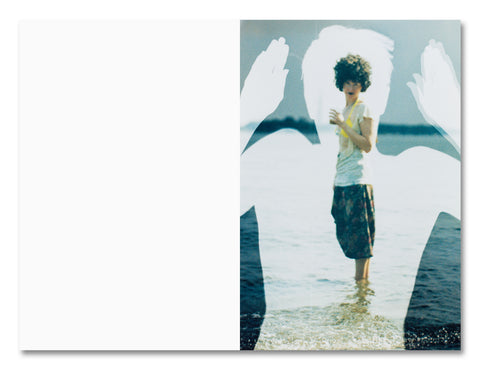 Open photography book titled "Positions" by MACK showing minimalist text and visual sequences on a clean white background.